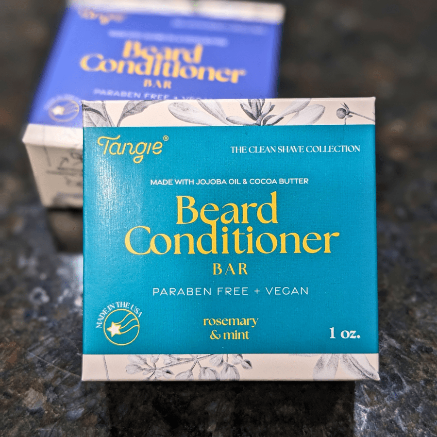Tangie Beard Conditioner Bar, Rosemary Mint scent, close-up of the front of the box, highlighting the product name and packaging design.