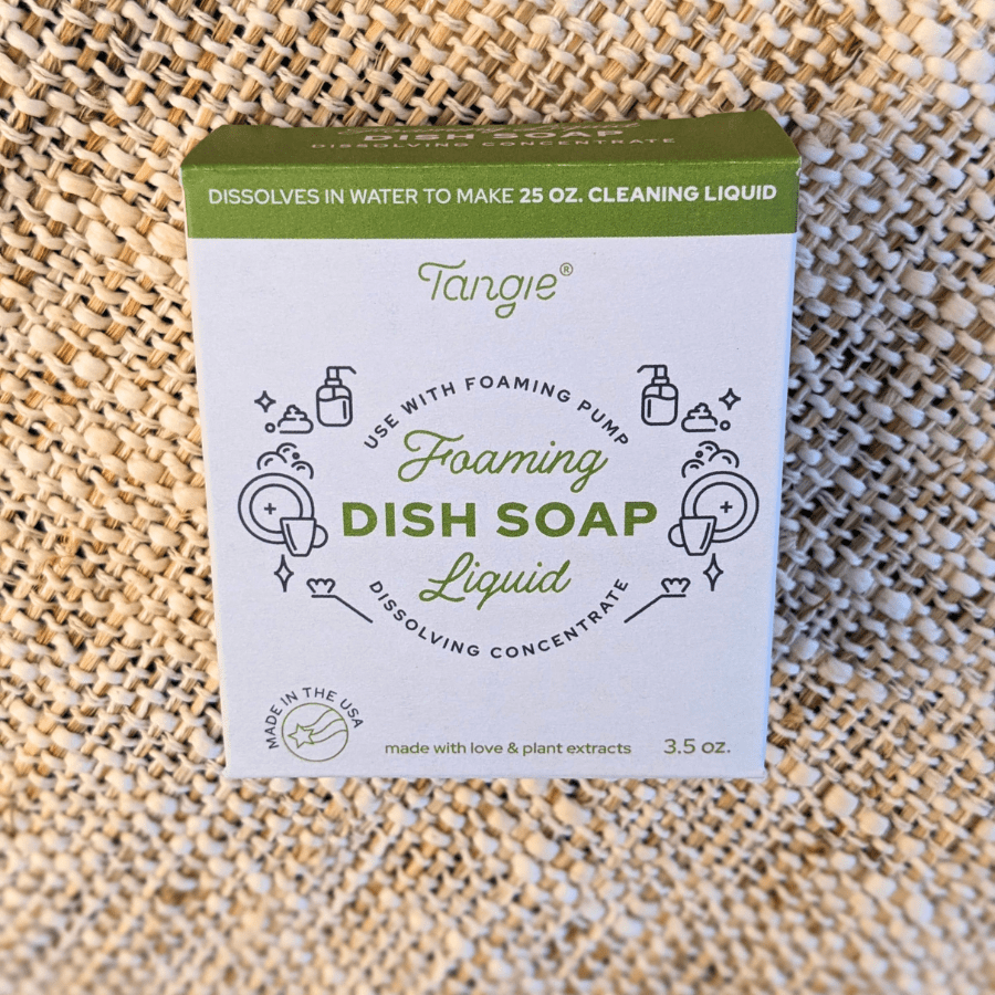 Front of Tangie Dish Soap Concentrate box by Tangieco on a natural textured background