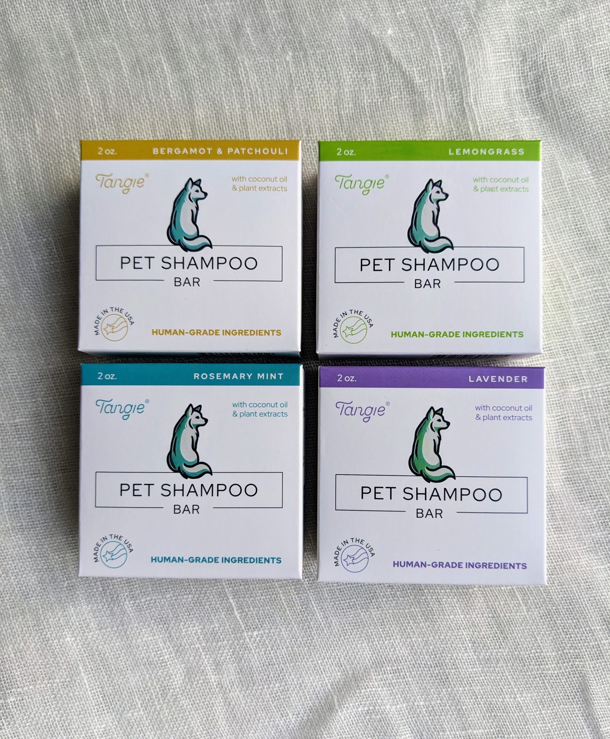 Tangie Pet Shampoo Bars in all variations, including Lemongrass, Lavender, Rosemary Mint, and Bergamot & Patchouli, with plastic-free packaging and human-grade ingredients.