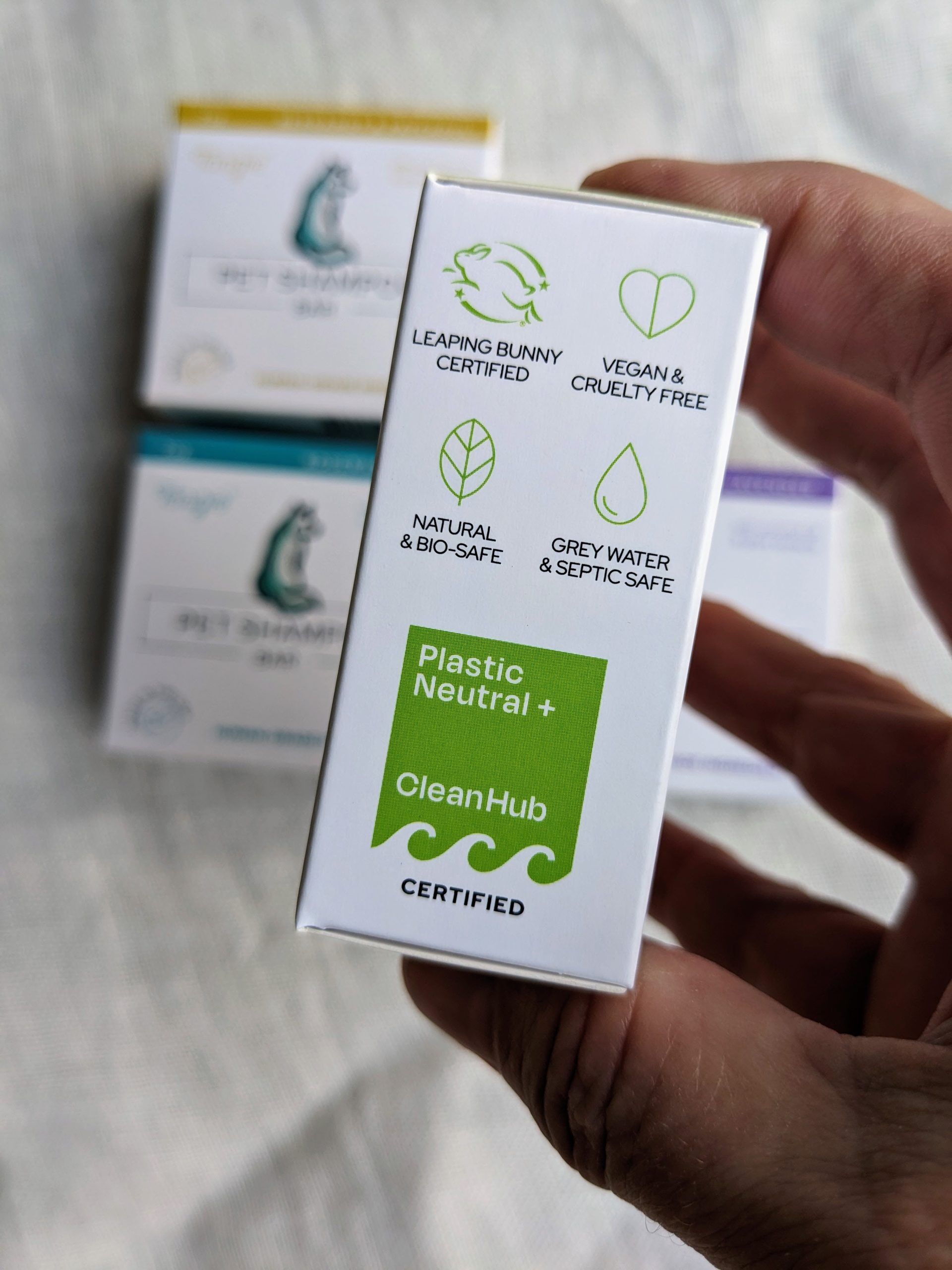 Tangie Pet Shampoo Bar certifications side panel showcasing Leaping Bunny Certified, Vegan & Cruelty-Free, Plastic Neutral+, and Grey Water Safe icons.