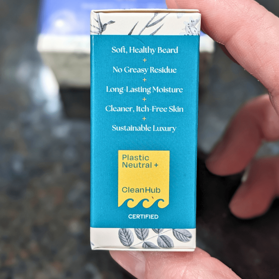 Tangie Beard Conditioner Bar, close-up of the benefits listed on the side of the packaging, highlighting hydration, frizz control, and sustainability.